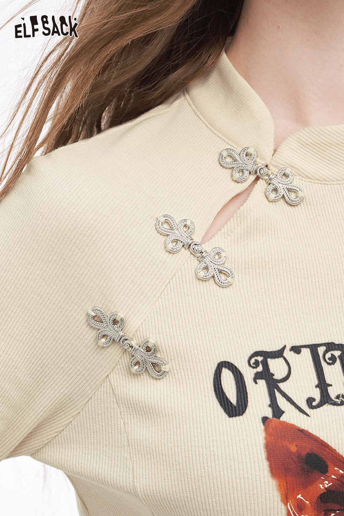 ELFSACK Soft Irregular Button Collar Bow Graphic Long Sleeve Tshirt