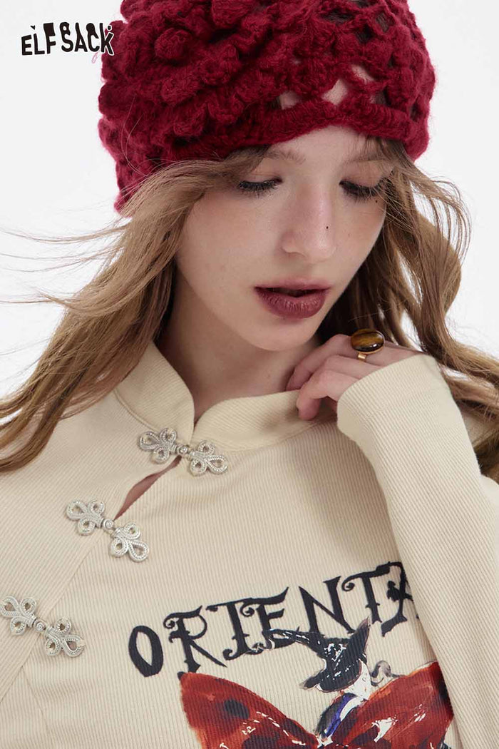 ELFSACK Soft Irregular Button Collar Bow Graphic Long Sleeve Tshirt